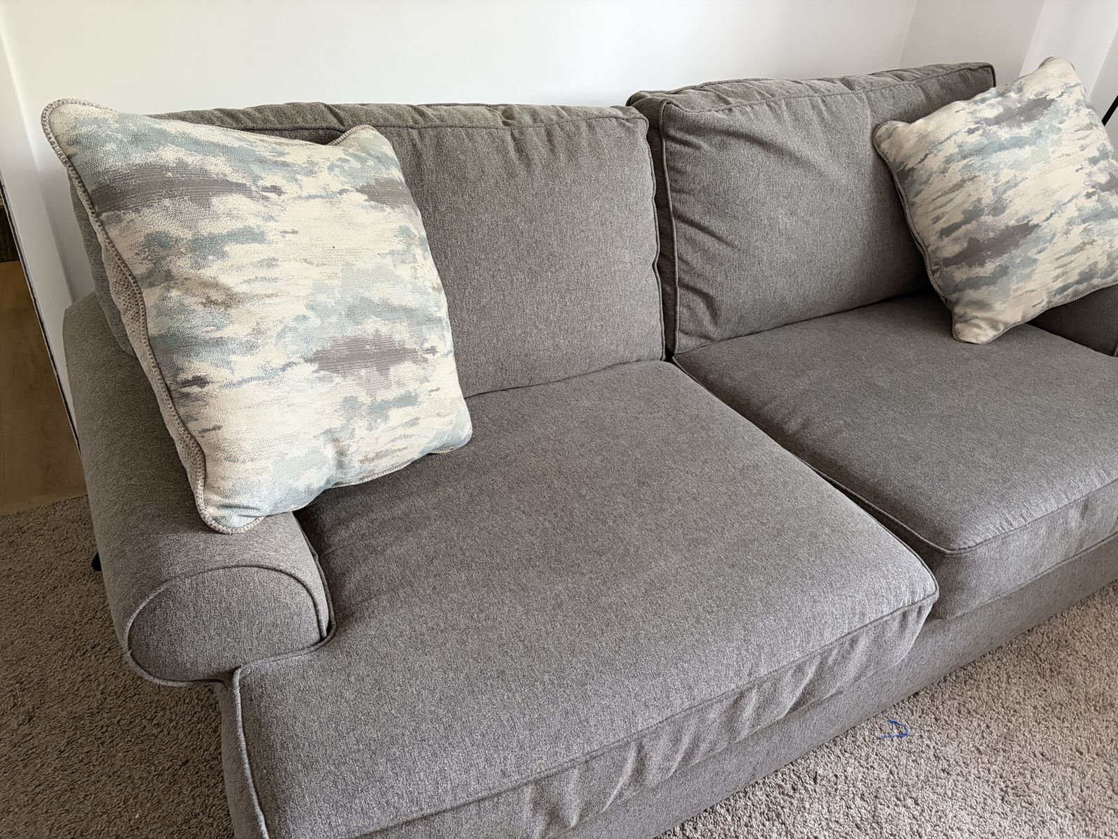 Haverty’s Gray Fabric Sofa with Accent Throw Pillows