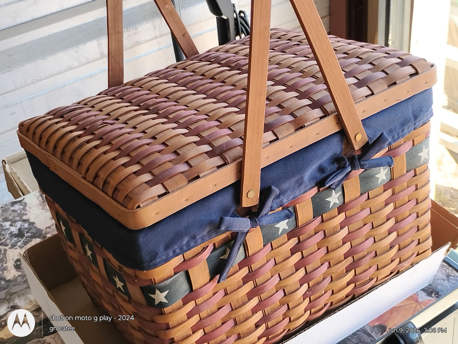 Woven Picnic Basket with Wood Handles, Patriotic Star Ribbon, and Blue Fabric Liner