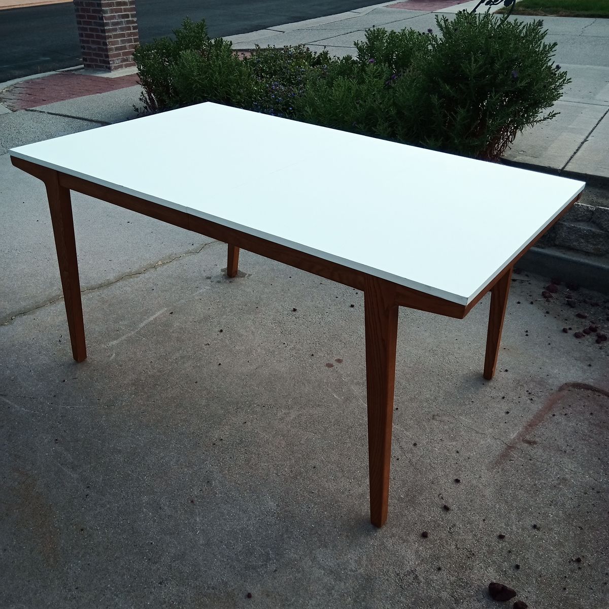 Contemporary/mid century style expanding melamine dining table