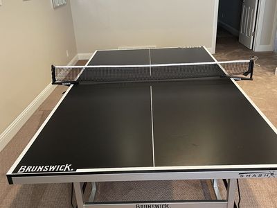 Compact ping pong table