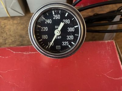 (4) different Stewart-Warner gauges