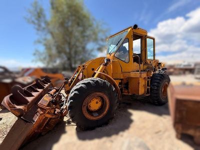 Cat 950 Loader with side dump trench bucket
