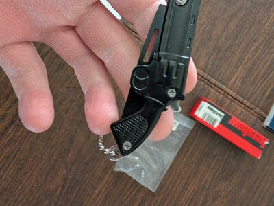Revolver pocket knife keychain