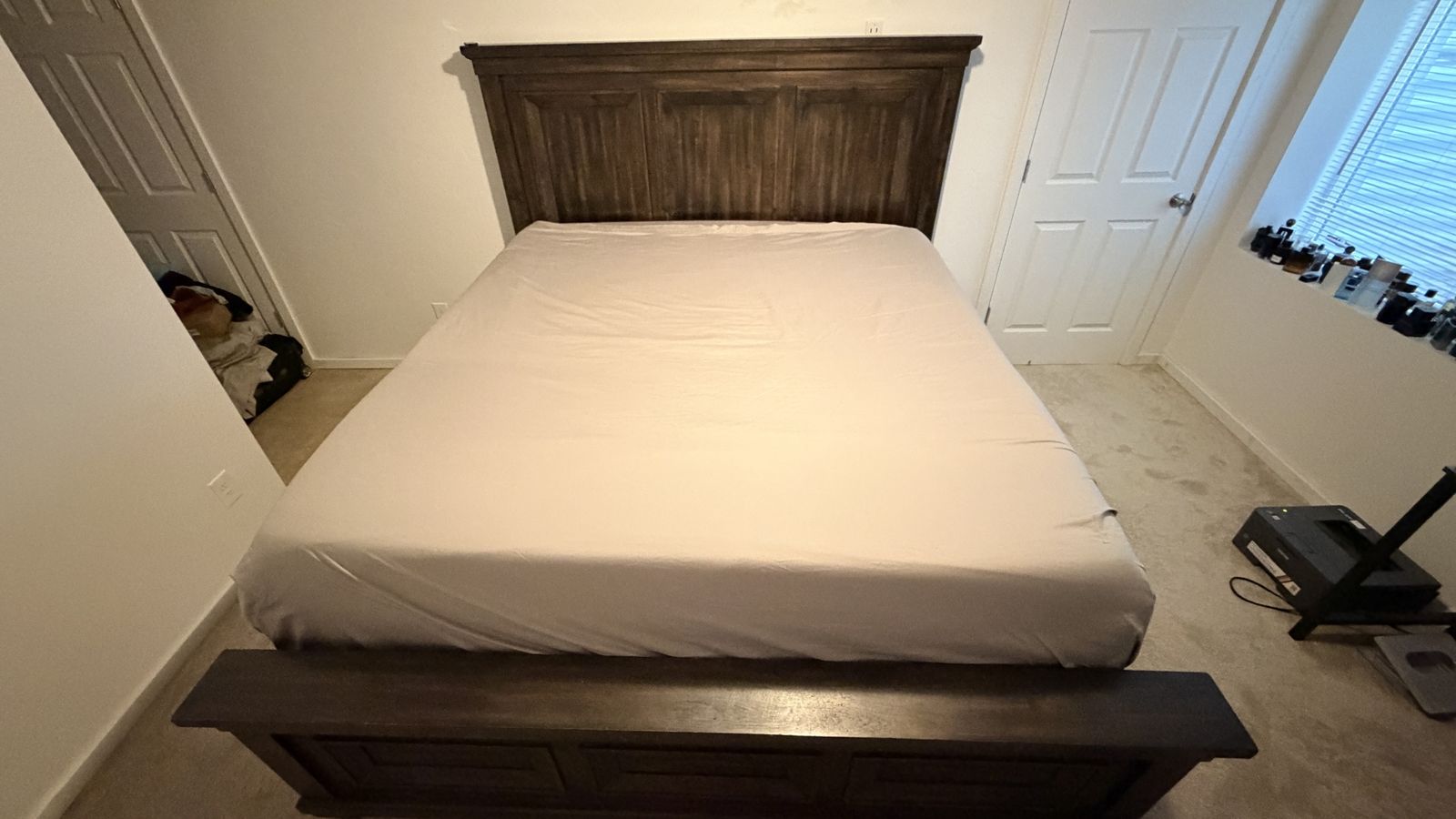 Heavy duty King bedroom set with large dresser and two nightstands that both have power plugins.