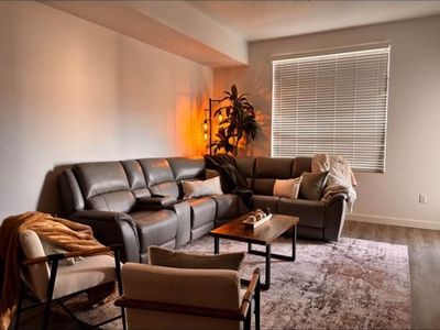 Grey Leather Reclining Couch