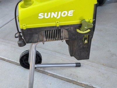 SunJoe Wood Chipper w/ collection bag (electric) and manual.