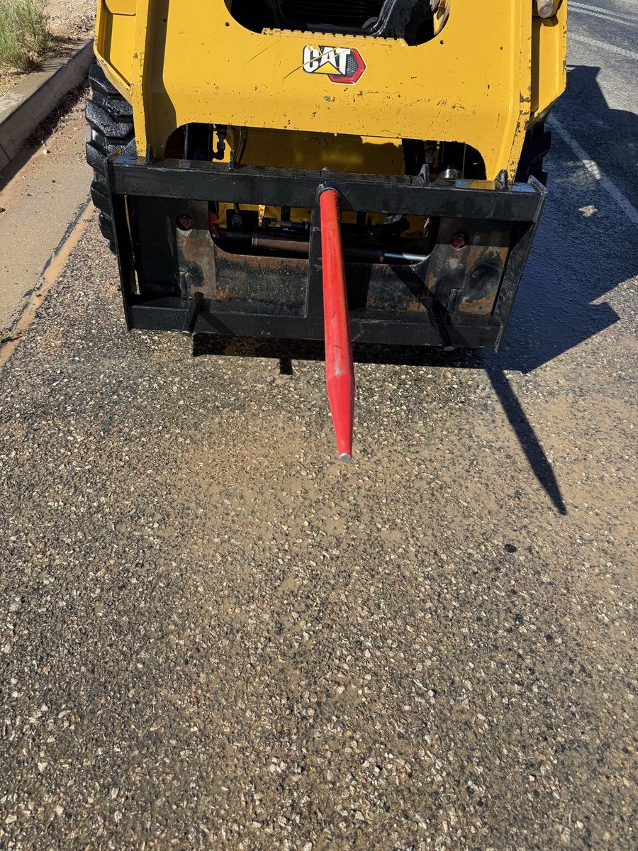 Hay bale spear attachment
