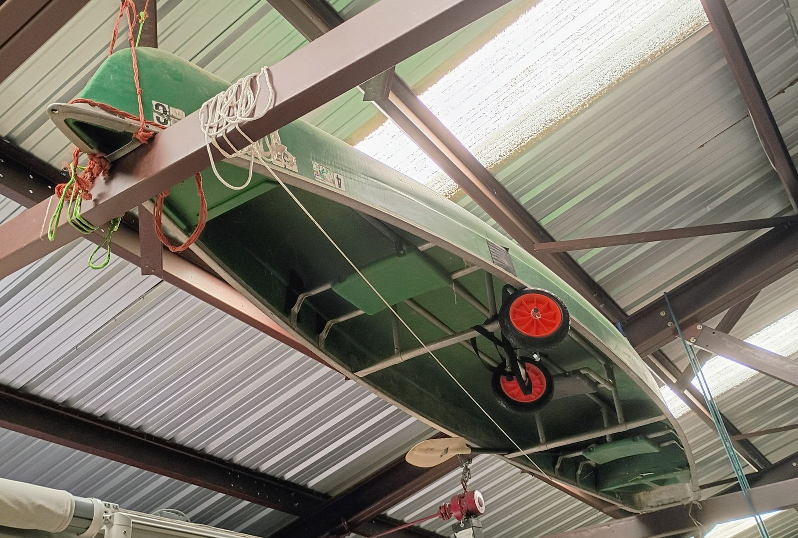 15 ft. Coleman canoe / boat with dolly and paddle.