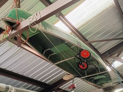 15 ft. Coleman canoe / boat with dolly and paddle.