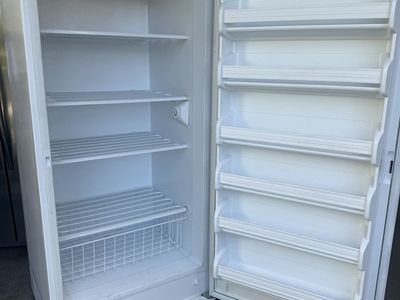 White Upright Freezer with Door Shelves and Wire Baskets works great no longer need $120