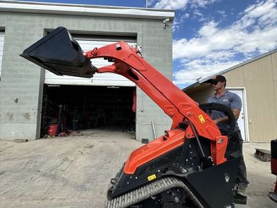 Kubota SCL1000 Mini Track Skid Loader Rental - 36 Inch Wide Gate Access
