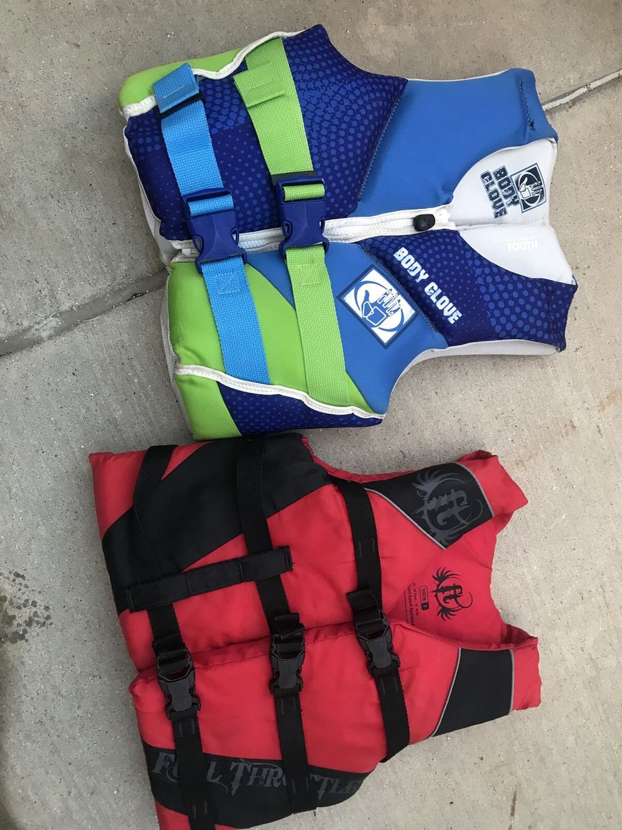 kids 30 to 50 pound life vests 10.00  adult orange vests 2 for 15.00