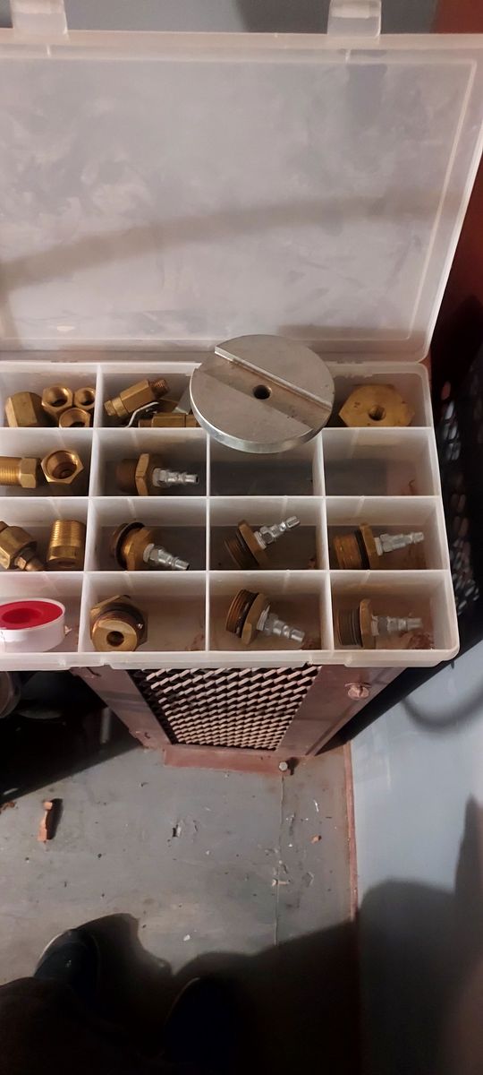 Fire extinguisher recharge kit and hydrostatic test cage