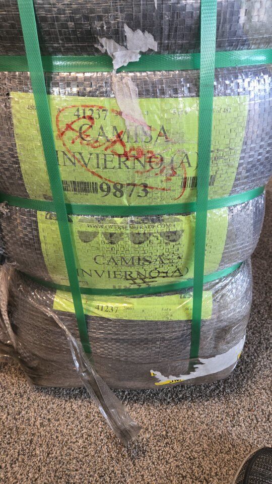 100 lb of winter clothing