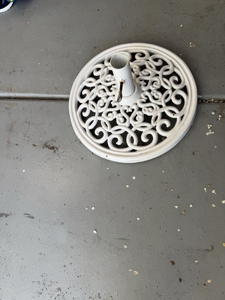 Heavy white umbrella stand