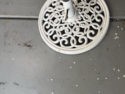 Heavy white umbrella stand
