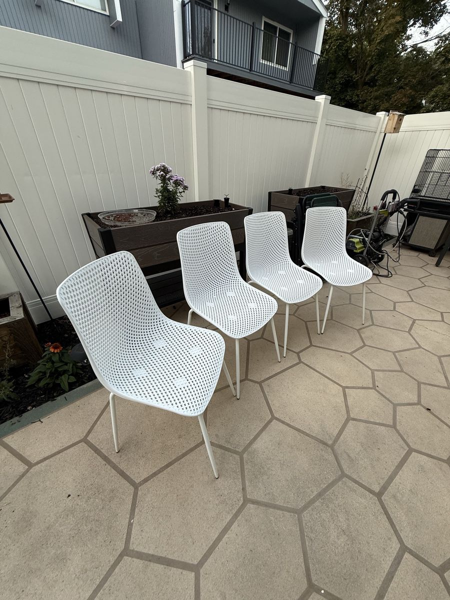 Set of 4 White Perforated Plastic Outdoor Patio Dining Chairs