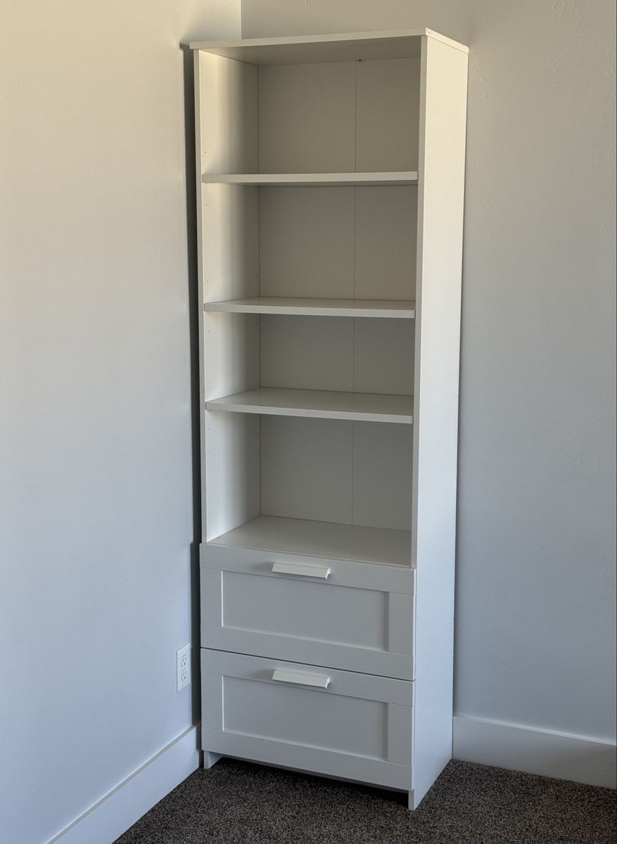 White bookshelf with drawers