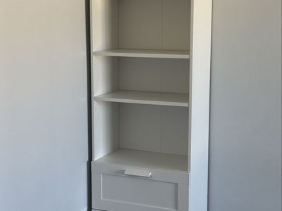 White bookshelf with drawers