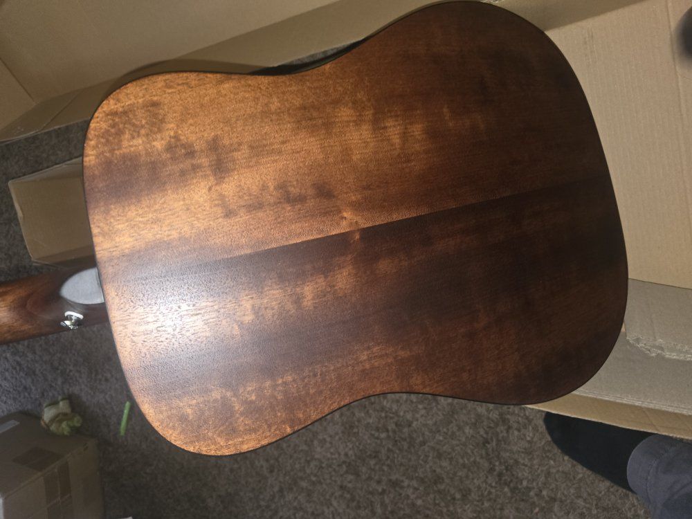 two acoustic guitars with minimal use for sale