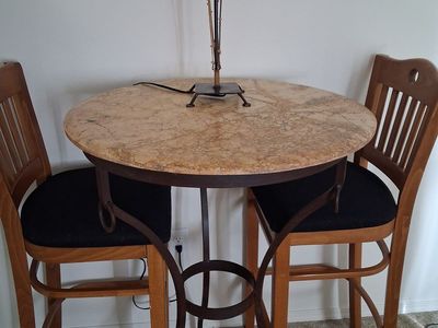 Bistro table and 2 bar stools for sale