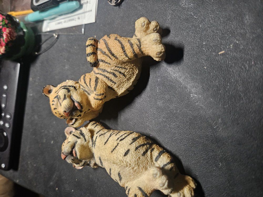 pair of tiger figurines