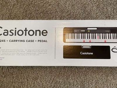 Brand new Casio Casiotone LK-S245 61-Key Lighted Keyboard, Sustain Pedal, Protective Case Bundle.