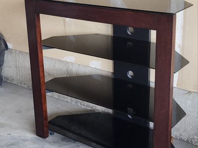 TV Stand with Dark Wood Frame and Tempered Glass Shelves