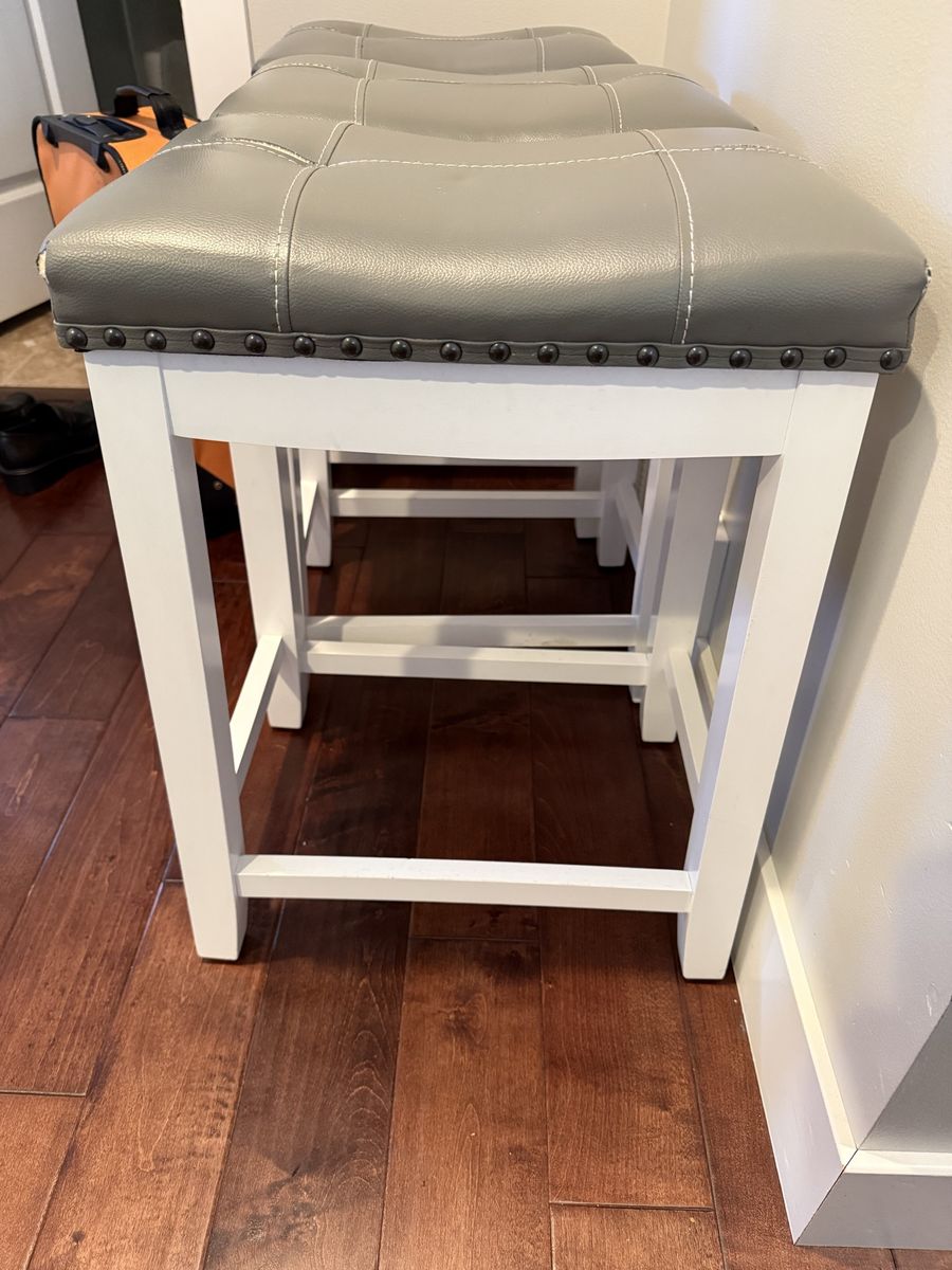 Set of 6 Grey Upholstered 24-inch Bar Stools with White Legs and Nailhead Trim