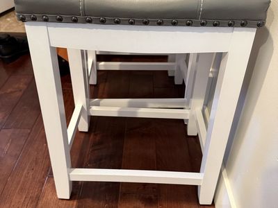 Set of 6 Grey Upholstered 24-inch Bar Stools with White Legs and Nailhead Trim