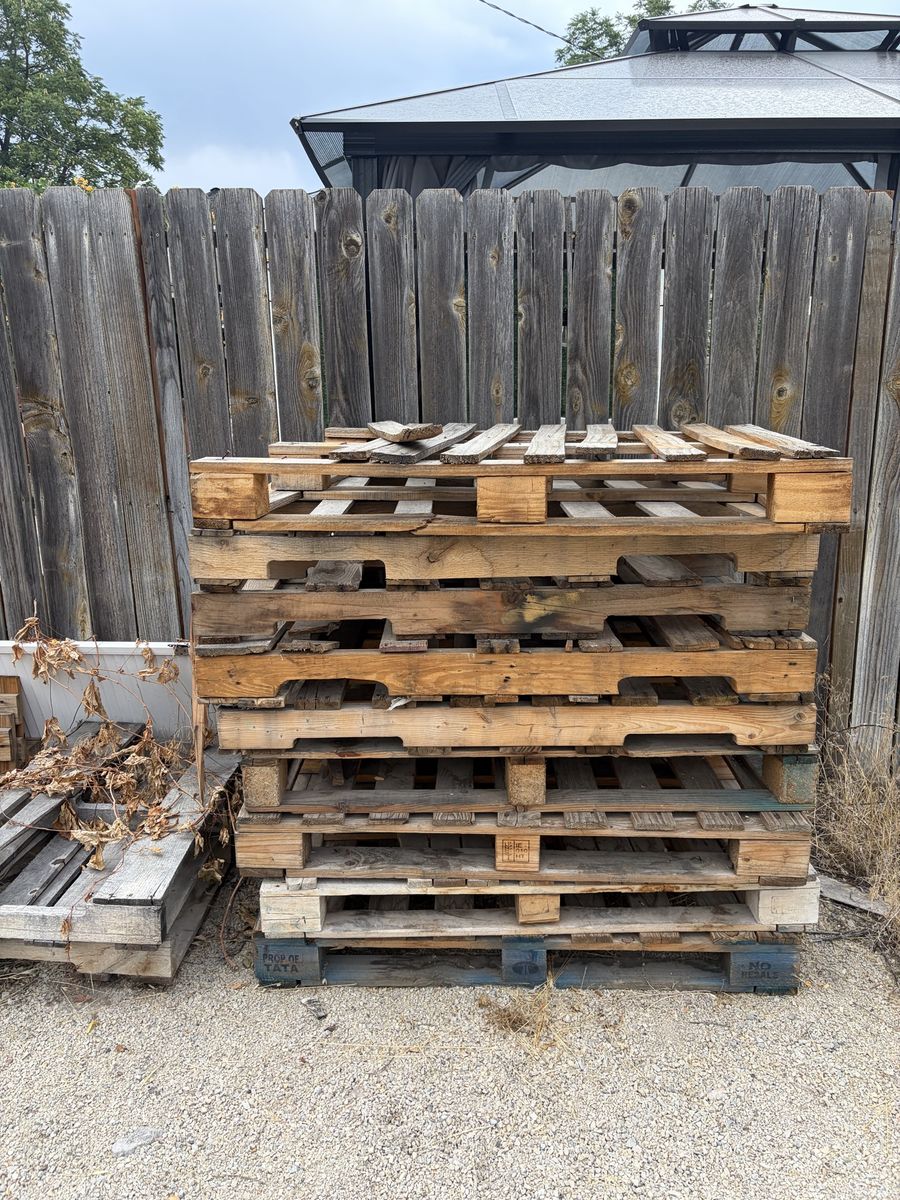 Wooden Shipping Pallets Stacked Lot