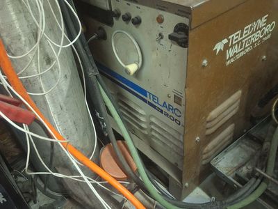Meg welder with Miller head long hoses and lead ang gauges