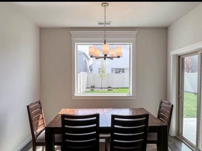 Anacortes Solid Wood Dining Table with chairs and bench