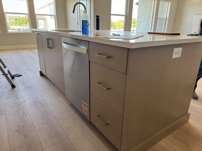 Kitchen Cabinets, Quartz Countertops, & Lighting