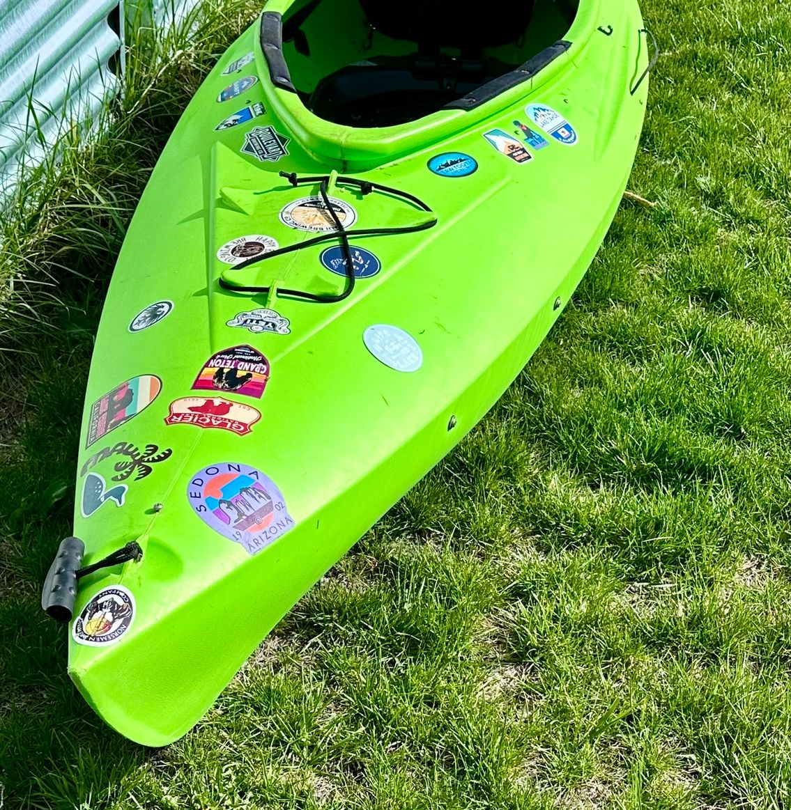 Nice Green Kayak Adventure Ready with Travel Stickers