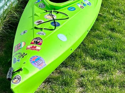 Nice Green Kayak Adventure Ready with Travel Stickers