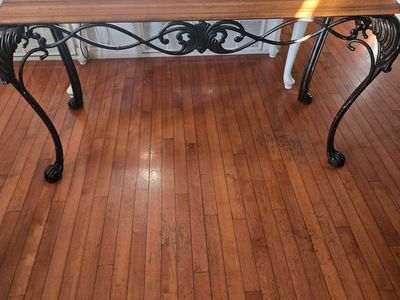 Elegant Console Table with Glass Top & Ornate Wrought Iron Base
