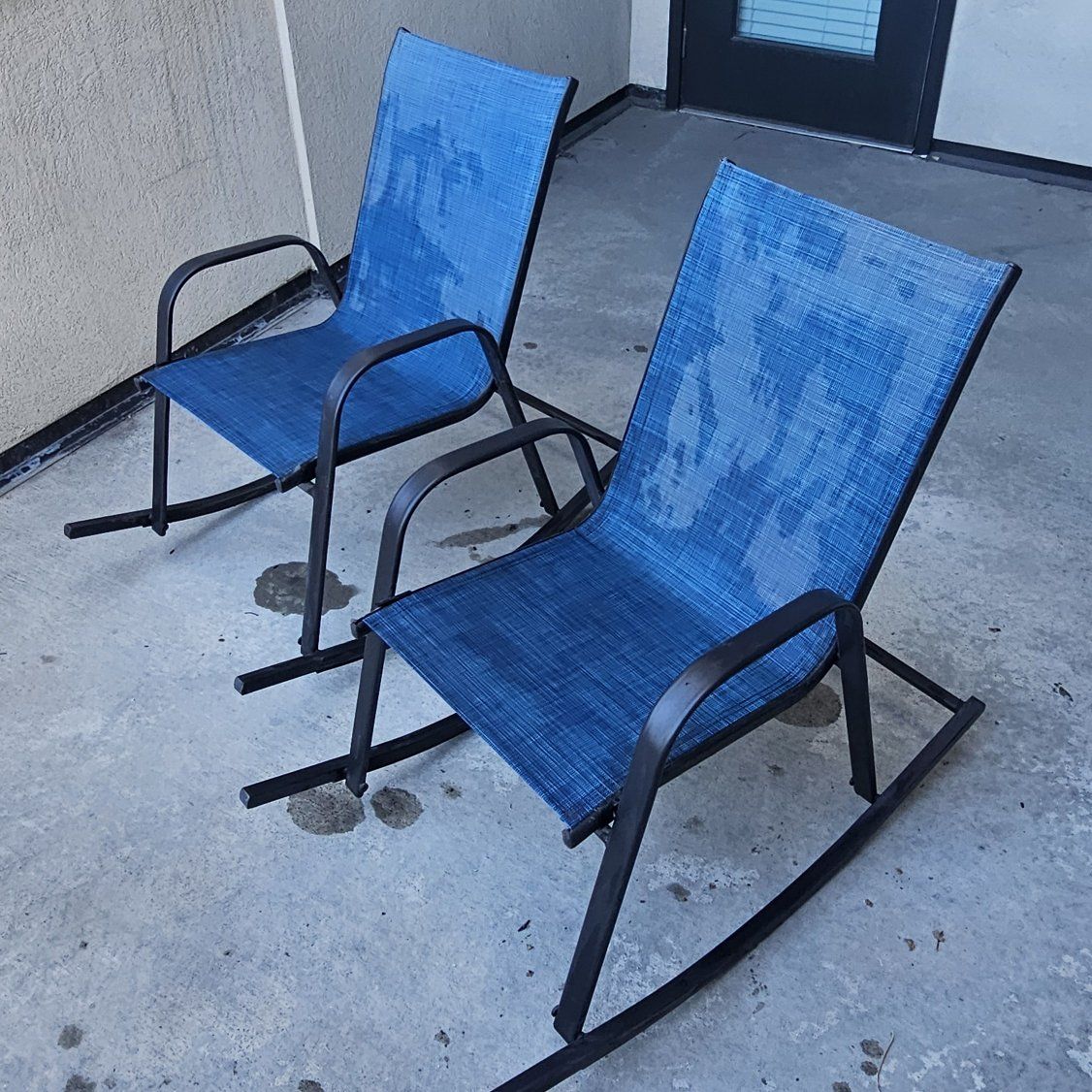 Two rocking patio chairs