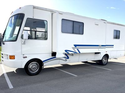 Immaculate condition 2003 sea breeze rare shorty 28FT whit super slide out super low miles easy to drive and park very clean!
