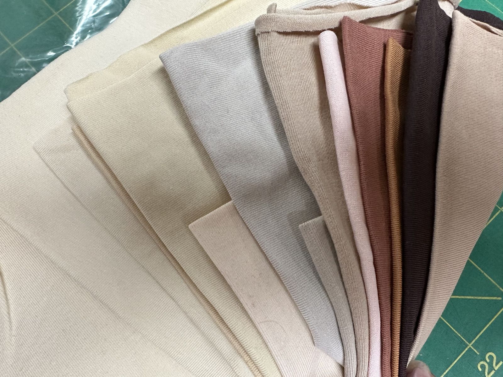 Assortment of Flesh-Tone Lycra Knits for Filling Voids.