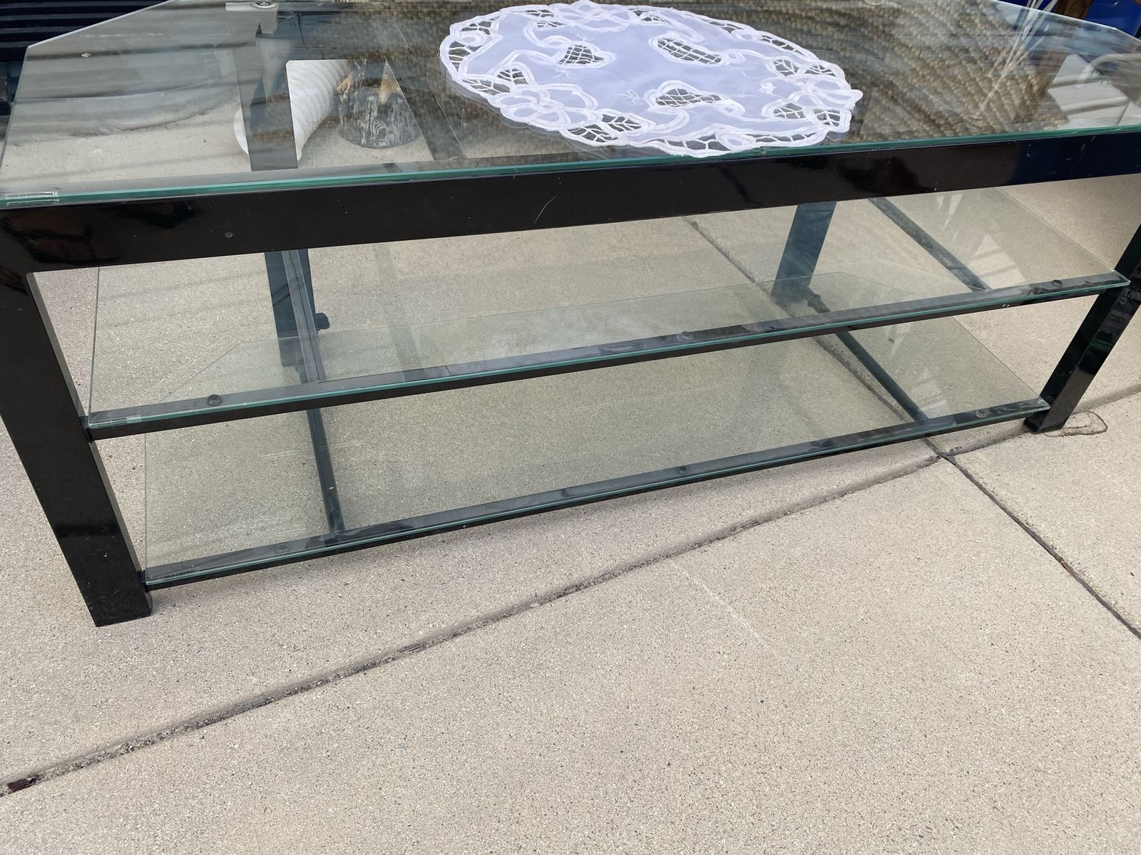 Glass and metal nice TV stand $20 (we can deliver for a fee depending on the area.