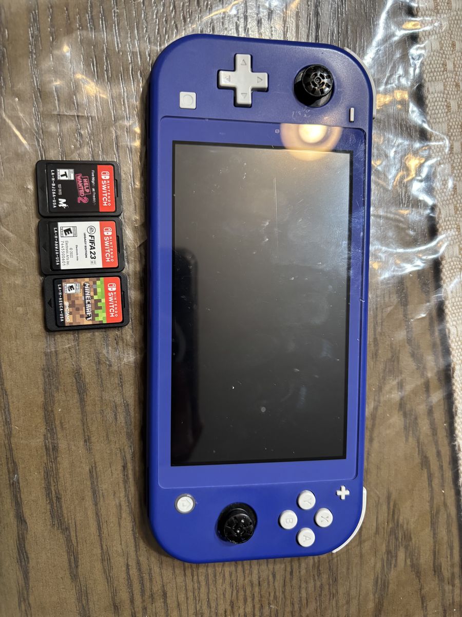 Nintendo Switch Lite With Games
