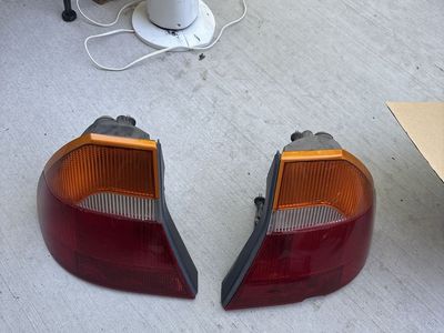 Pair of OEM Automotive Tail Light Assembly Assemblies Left & Right for a ‘99 Chrysler 300