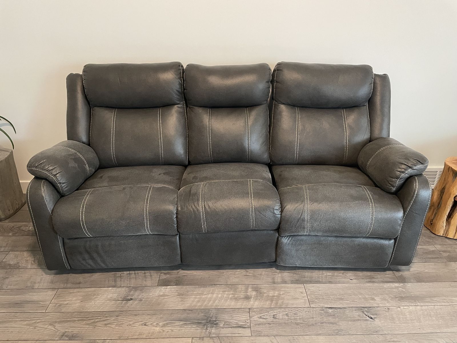Reclining sofa with fold down table 