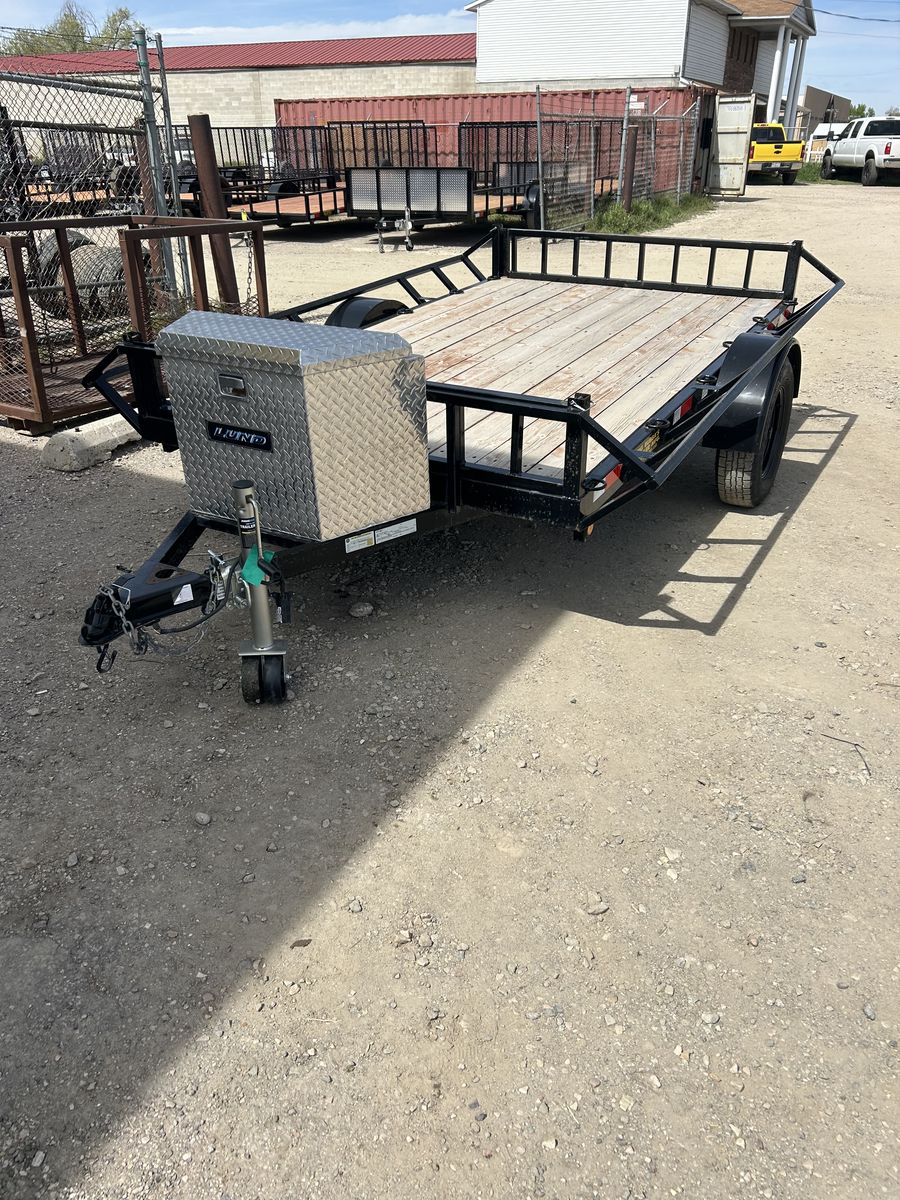 Used Big Bubbas 6x10 side load atv trailer with tool box