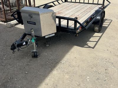 Used Big Bubbas 6x10 side load atv trailer with tool box