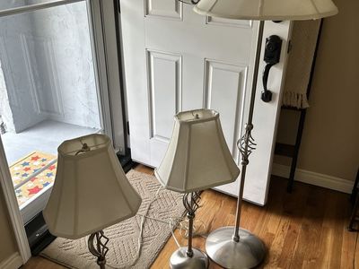Set of 3 Brushed Silver Lamps: 2 Table Lamps & 1 Floor Lamp with Scrolled Accents, Beige Shades