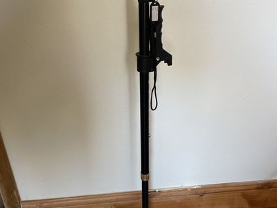 Adjustable walking cane w / flashlight