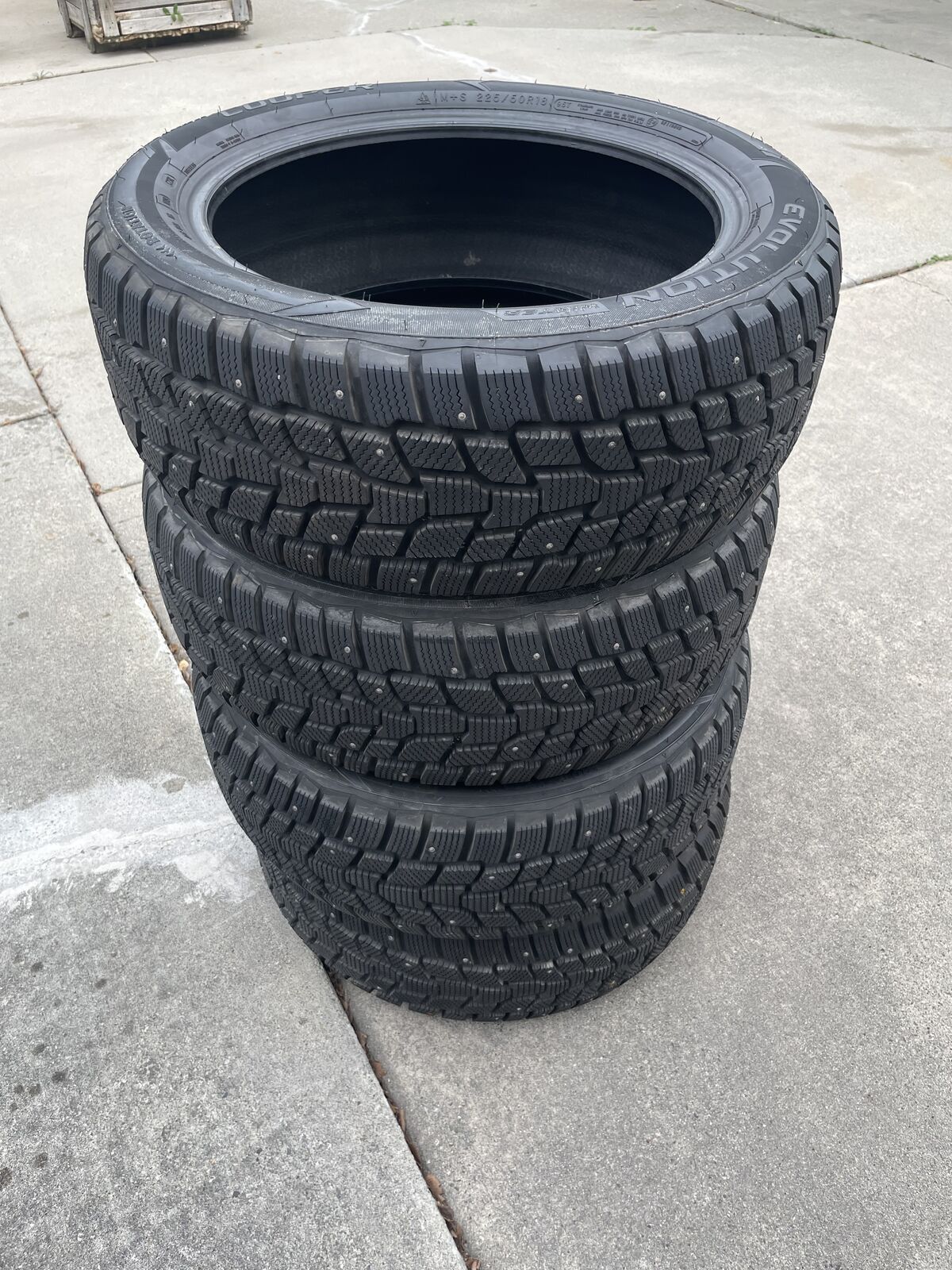 Cooper  225/50 R18 studded snow tires like new.
