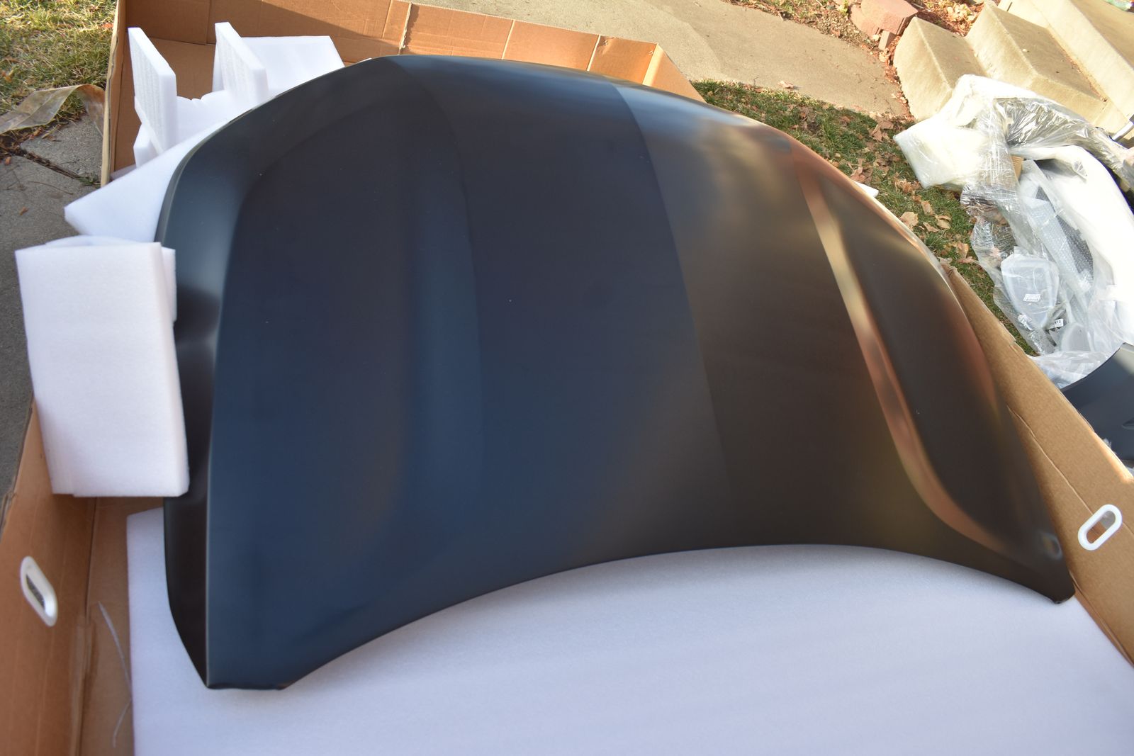 Unpainted possible 16-20 car hood